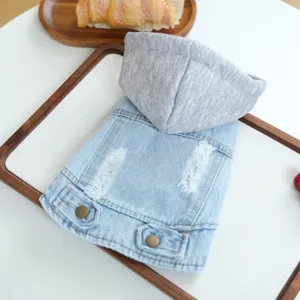 Pet dog denim hoodie jacket detail showing light blue jean fabric and grey cotton hood.