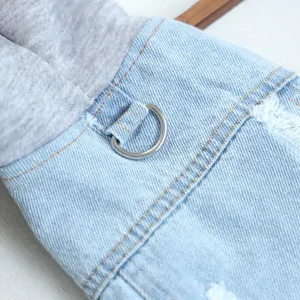 Denim pet hoodie detail view featuring soft grey fabric insert and sturdy metal D-ring leash hook.