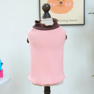 Detail shot of pink pet undershirt with brown rolled edge collar for small dogs and puppies.