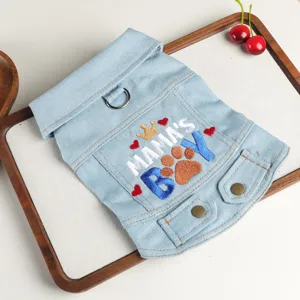 Pet denim clothes detail showing cute embroidered letters, lapel design, and D-ring for small dogs.