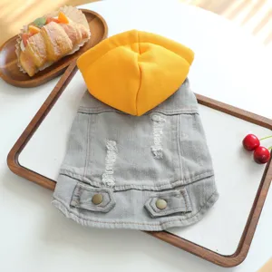 Cute pet denim hoodie with yellow hood, stylish ripped dog clothes for small puppy apparel.