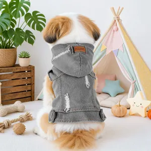 Stylish distressed denim dog hoodie, vintage pet jacket detail view for cute puppies.