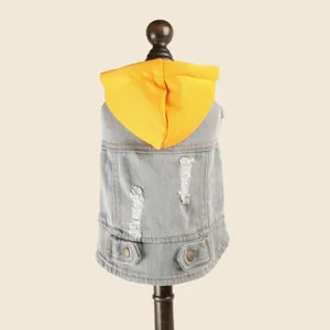 Detail view of grey denim dog jacket with bright yellow hood and distressed back design.