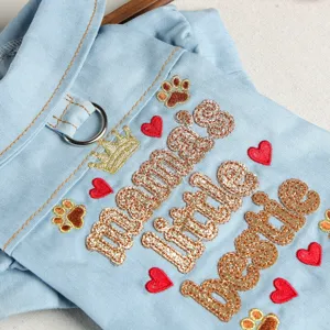 Light blue denim pet shirt with crown and heart embroidery, leashable design for cats dogs.