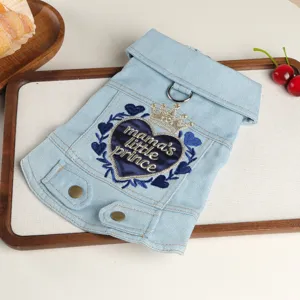 Detailed view of the cute small dog denim jacket with lovely heart embroidery and lapel design.