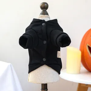Black pet hoodie for small dogs, cute button-up autumn puppy clothes for festival.