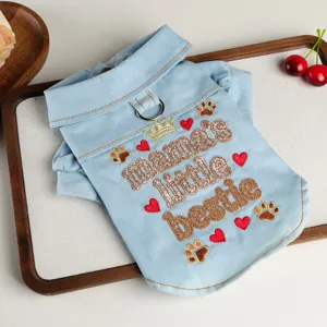 Cute denim pet clothes for small dogs, stylish turn-down collar with sweet embroidery design.
