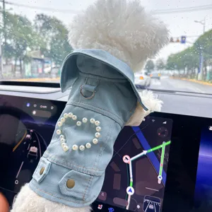 Detailed view of cute small dog denim pet clothes with pearl heart design, stylish and comfortable.