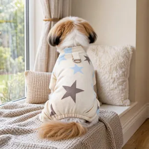 Soft cozy dog onesie detail view showing cute star print and convenient back traction buckle.
