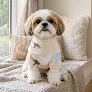 Close-up detail of soft pet jumpsuit with cute star print for small dogs, cozy home wear.