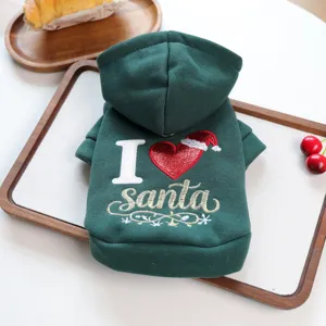 Green Christmas pet hoodie with cute Santa embroidery and hood, detailed view of holiday clothing.