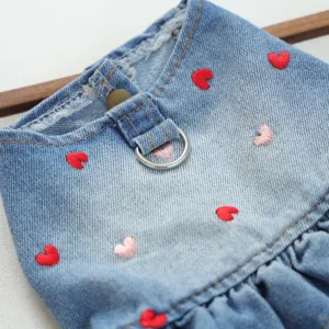 Cute denim pet dress with embroidered hearts, featuring metal D-ring and metal snap button details.