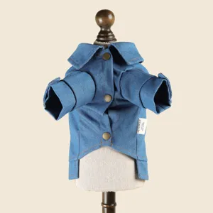 Blue denim pet jacket for small dogs, featuring a stylish lapel design and metal buttons.