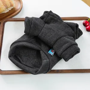 Detailed view of the dark grey pet hoodie, showcasing the thick fleece fabric and neat folding.