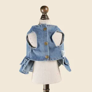 Denim pet dress detail showing cute ruffles and metal snap buttons for stylish dogs and cats.