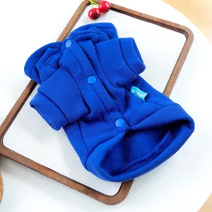 Blue pet hoodie detail with snap buttons and hood, perfect for small dogs autumn wear.