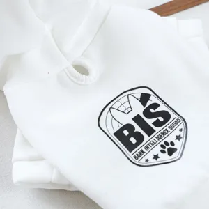 Close-up detail of white pet hoodie with stylish BIS print, soft cozy puppy clothing.