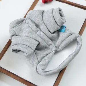 Detailed view of a soft gray pet hoodie with snap buttons and warm lining for puppies and cats.