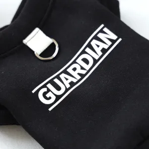 Black pet clothing detail view with white letter print and metal D-ring for daily walking.