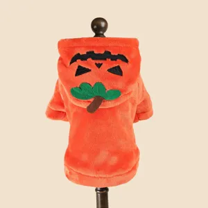 Halloween pet costume detail showing soft orange plush fabric with cute pumpkin hood.