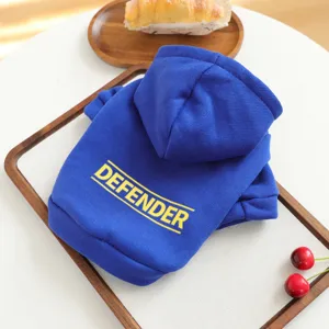 Blue pet dog hoodie detail shot showcasing soft fabric texture and yellow letter print.