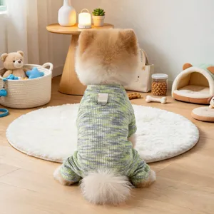 Charming knitted pet dog clothes for small puppies, cozy green patterned four-leg apparel with leash ring.