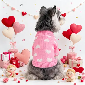 Cute pink knitted dog sweater with white hearts for small dogs, perfect for Valentine's day.