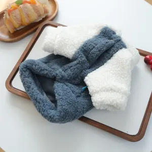 Detail shot of cozy pet fleece hoodie in dark grey and white lamb wool, warm puppy apparel.