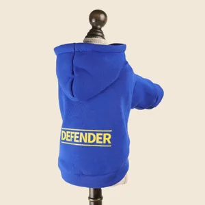 Blue pet dog hoodie sweatshirt with yellow defender letter print, small puppy apparel detail.