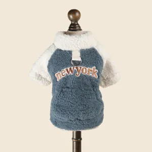 Cozy fleece pet dog hoodie with warm sherpa collar and embroidered new york text design.