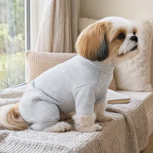 Detailed view of cute striped pet dog onesie jumpsuit, soft cozy apparel for small puppies in spring.