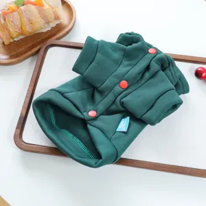 Dark green pet hoodie detail, soft dog apparel with red buttons, cozy puppy sweatshirt.