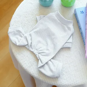 Cute striped dog onesie detail, soft cotton pet apparel for small dogs and puppies home wear.