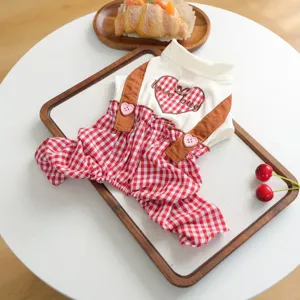 Cute red plaid pet overalls with heart embroidery and pull ring for cats and dogs, spring style.