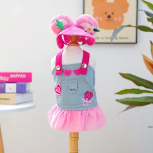 Pink denim pet dress and cute strawberry ear hat set for small dogs and cats fashion outfit.