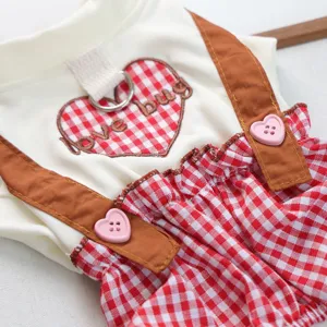 Cute red gingham pet puppy dog clothes with cute straps and heart buttons for spring summer.