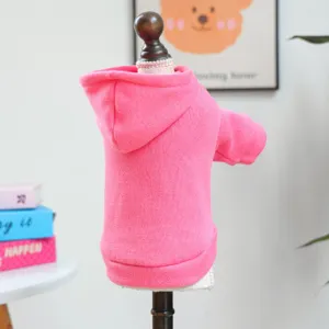 Detailed view of the cute pink pet hoodie with a cozy hood, designed for small dogs.