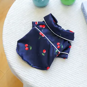 Cute cherry print pet satin pajamas detail, comfortable sleepwear for small dogs and cats.