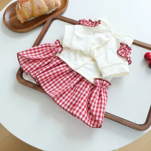 Cute red and white plaid pet dress for dogs and cats, stylish ruffles and comfortable wear.