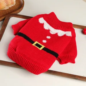 Close-up detail of festive red knit pet sweater with cute Christmas Santa design for small dogs.