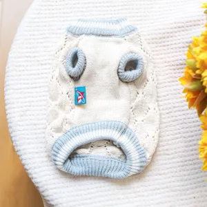 Cute hollow knit dog sweater in cream and blue, breathable pet clothing for small puppies daily wear.