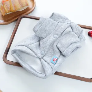 Detail view of the grey small dog hoodie, showing button closure and soft fabric texture.