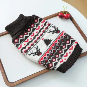 Close-up detail of the winter pet knit sweater featuring festive deer and tree patterns.