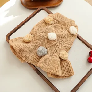 Cute small dog knitted sweater dress with colorful pom poms, cozy pet winter warm apparel.