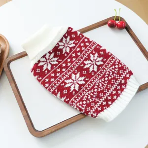 Cozy red and white knitted pet sweater with classic winter snowflake pattern for cats and dogs.