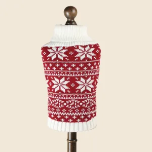 Detailed view of red and white Christmas pet knit sweater with classic snowflake pattern.