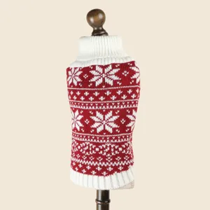 Detailed view of the red and white knit pet sweater featuring classic Nordic snowflake pattern.