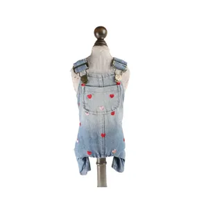 Cute pet denim overalls for small dogs, featuring sweet red heart embroidery and metal buckles.