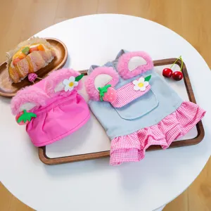 Cute pet denim dress and hat set with plush ears and strawberry detail, perfect detail view.