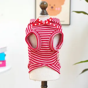 Close-up detail of red and white striped pet hoodie, featuring cute bow for small dogs.